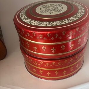 Two Red and Gold Decorative Tins